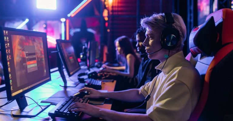 Monitor Setup - A Man with Black and Silver Headphones