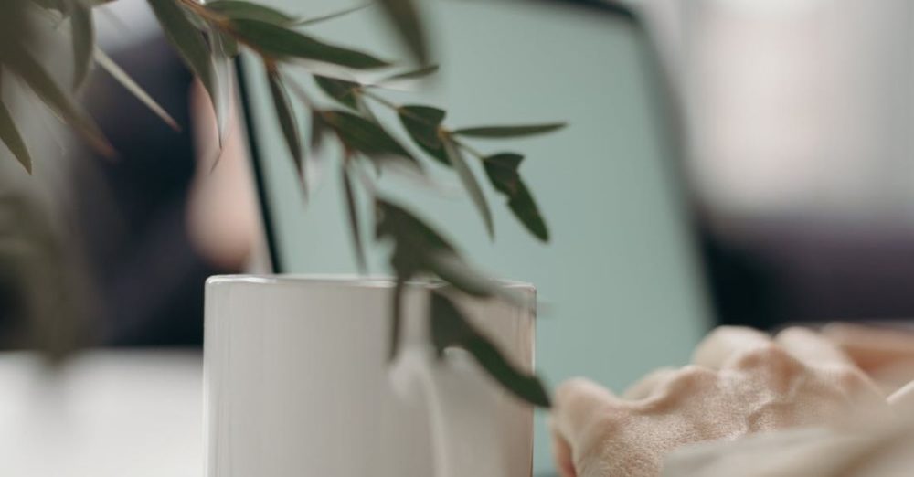 Desk Gadgets - White Ceramic Mug on White Table