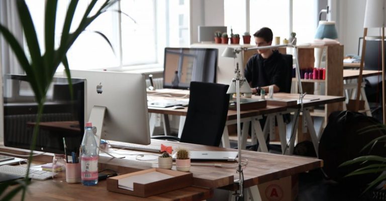 Office - Man Sitting in Front of Computer