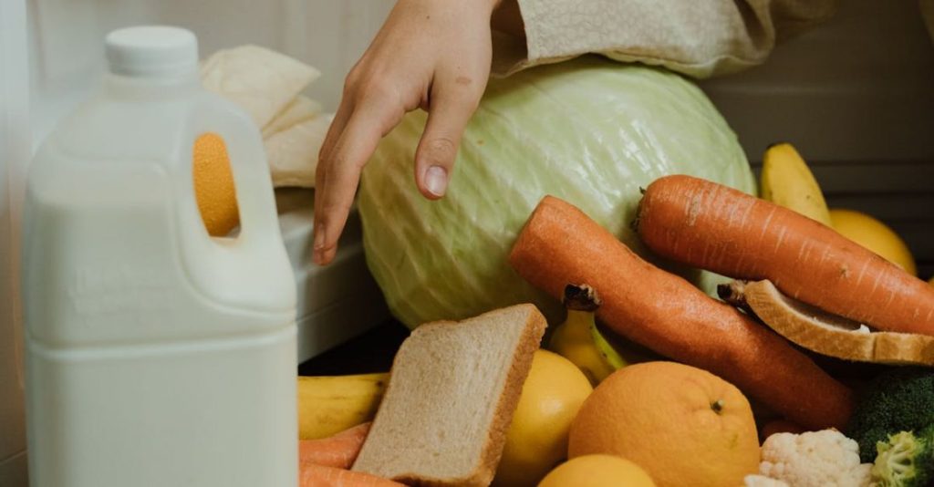 Declutter - Person Removing Food on the Refrigerator