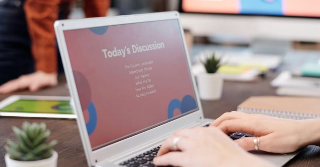 Meeting Agenda - A Person Typing on a Laptop