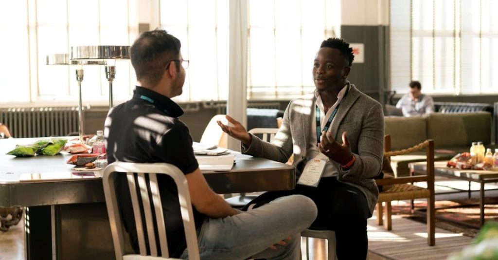 Meeting - Photo of Men Having Conversation