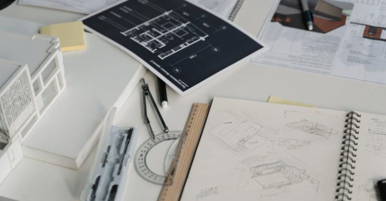 Office Designs - Printed Designs and Drawings over the Work Table