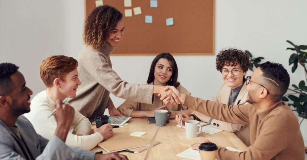 Collaboration - Colleagues Shaking each other's Hands